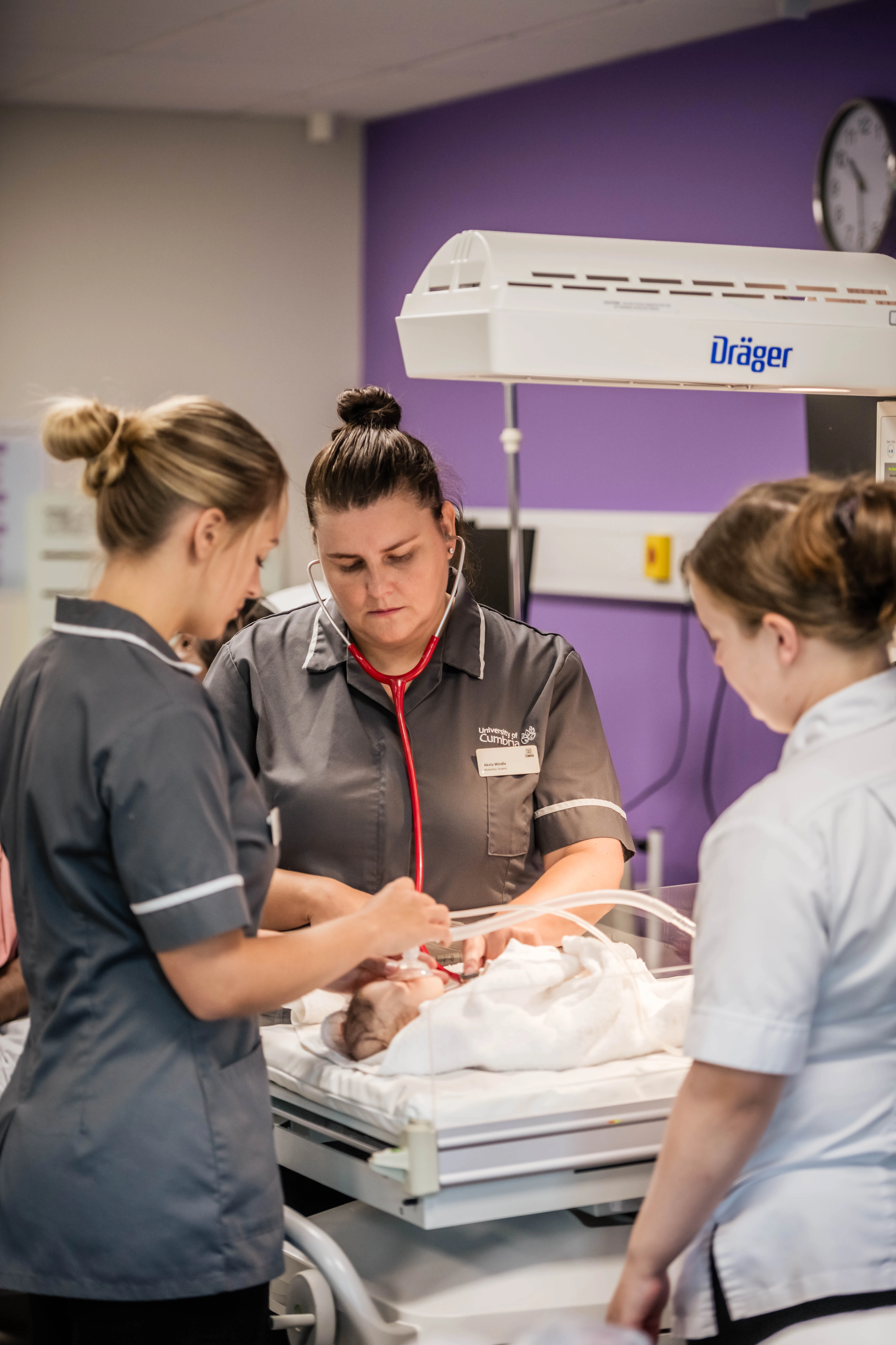 Students practising key skills in the Midwifery suite Students practising key skills in the Midwifery suite