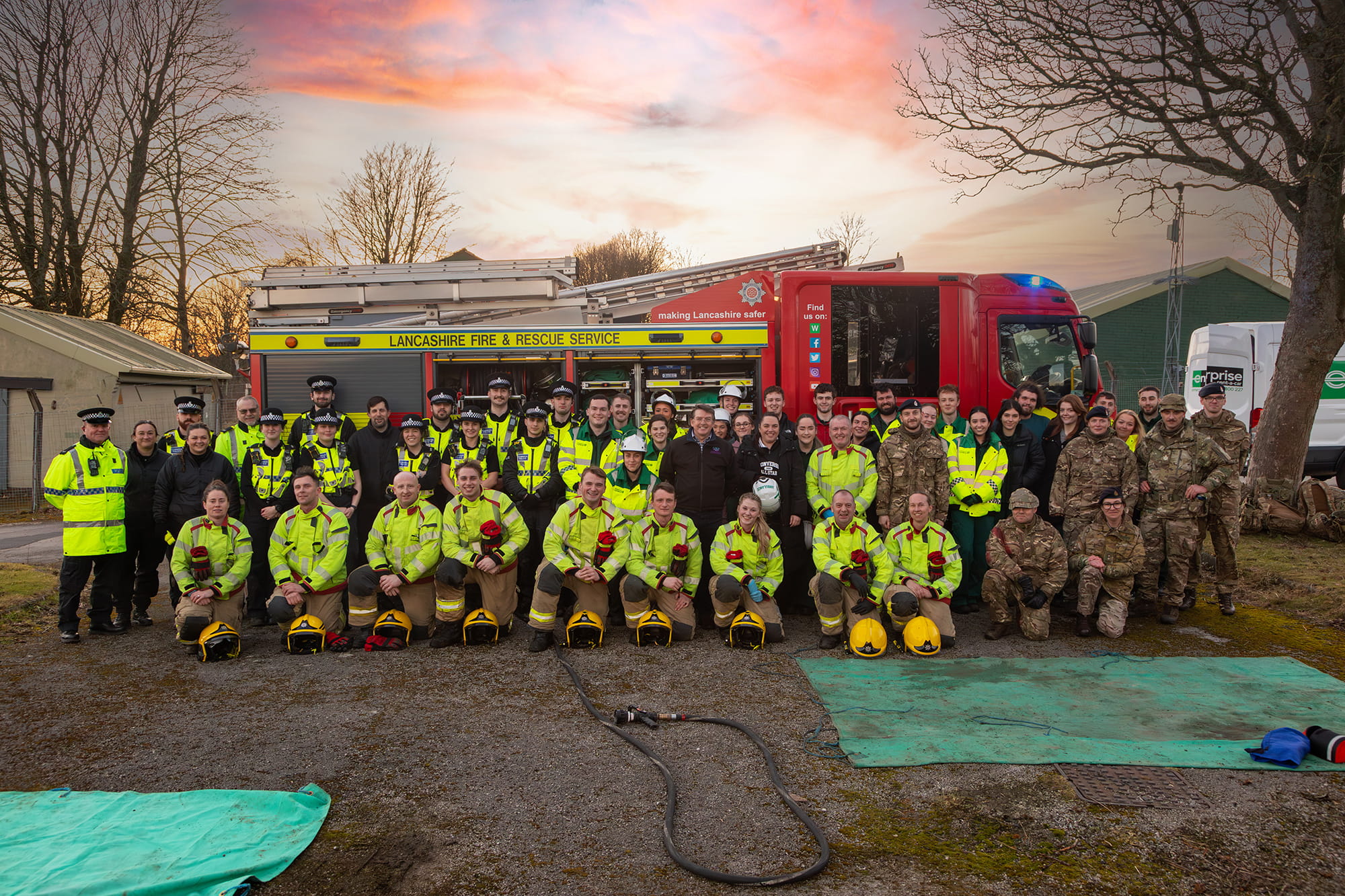 A group of emergency service workers pose for a photo A group of emergency service workers pose for a photo